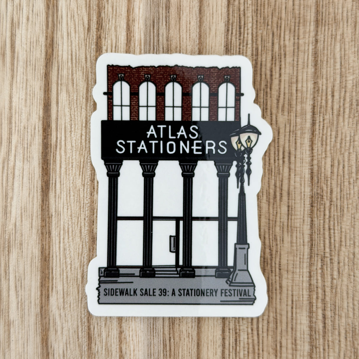 Atlas Stationers Sticker - Clear Storefront (Sidewalk Sale 2026)