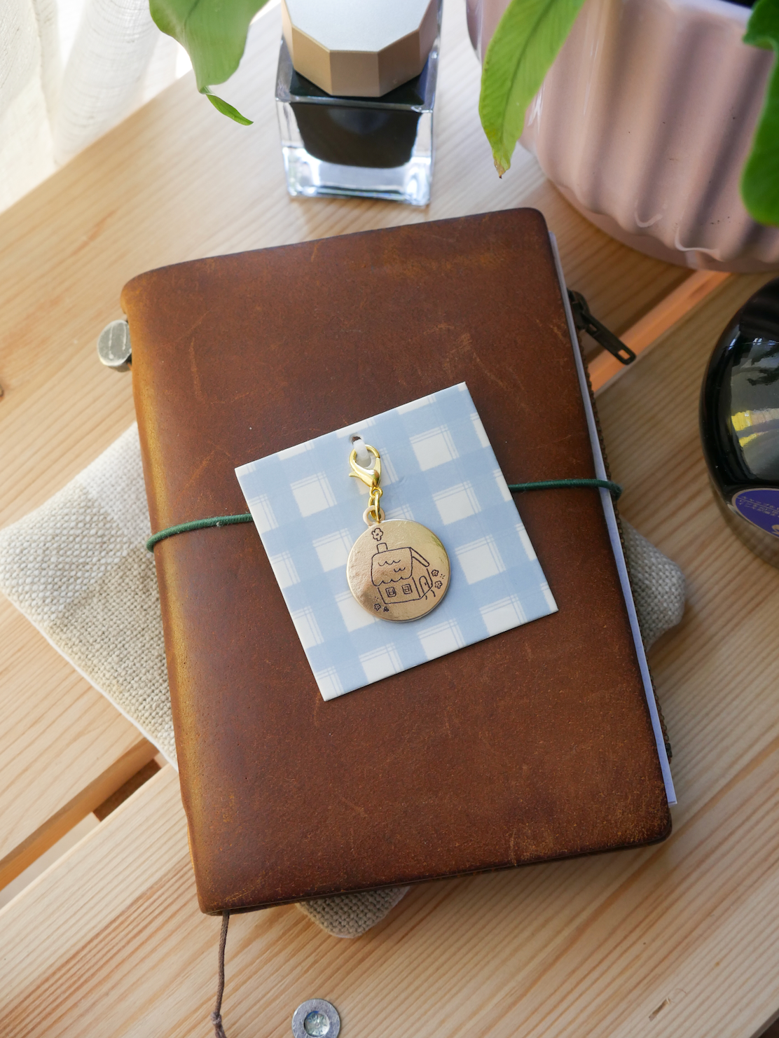 dana ate oatmeal! "stay a while" brass charm