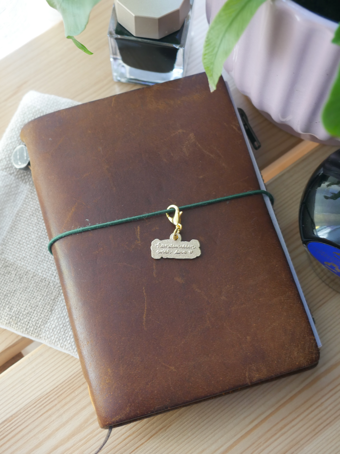 dana ate oatmeal! "handwritten with love" brass charm