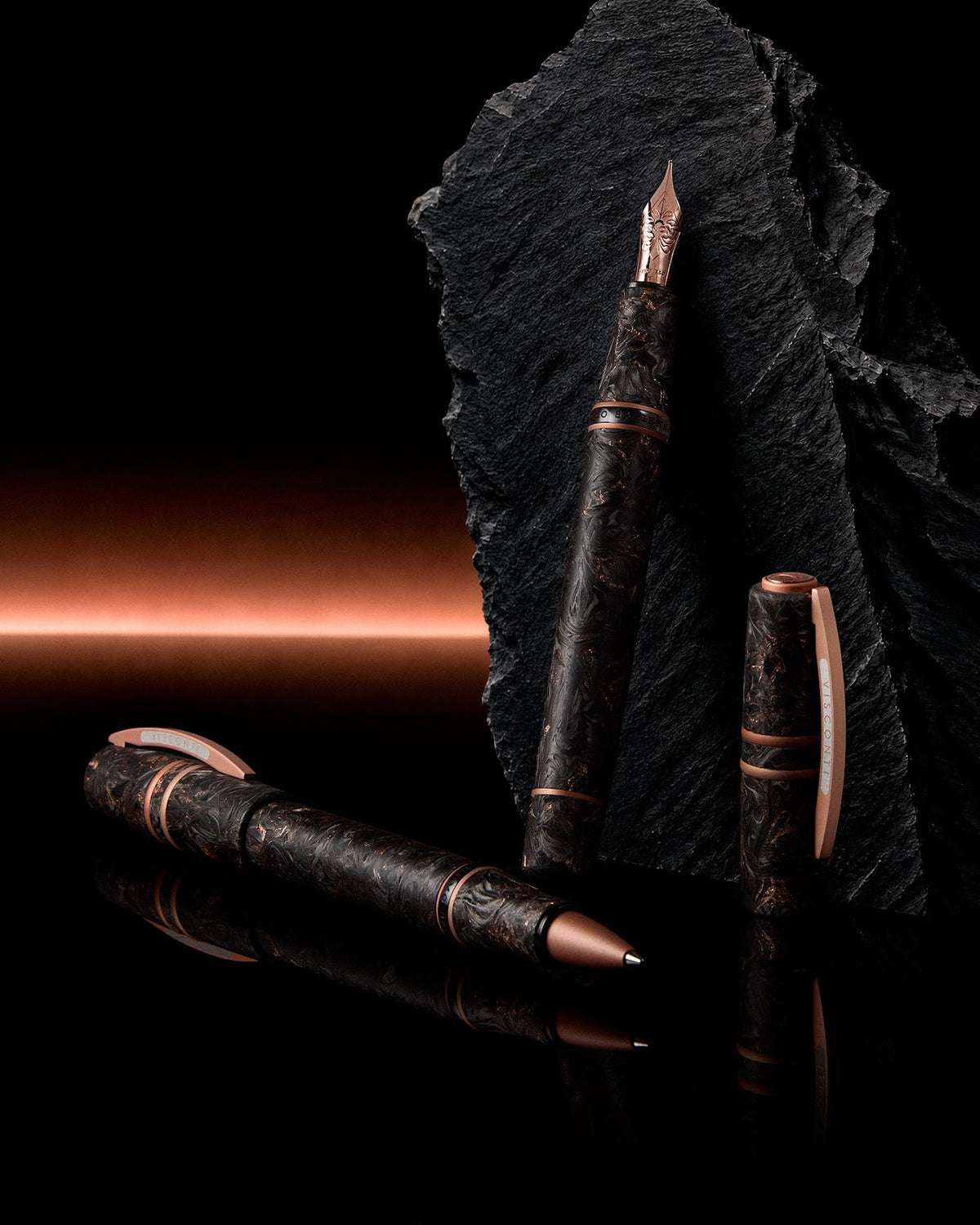 Visconti Homo Sapiens Carbon Rose fountain pen and rollerball