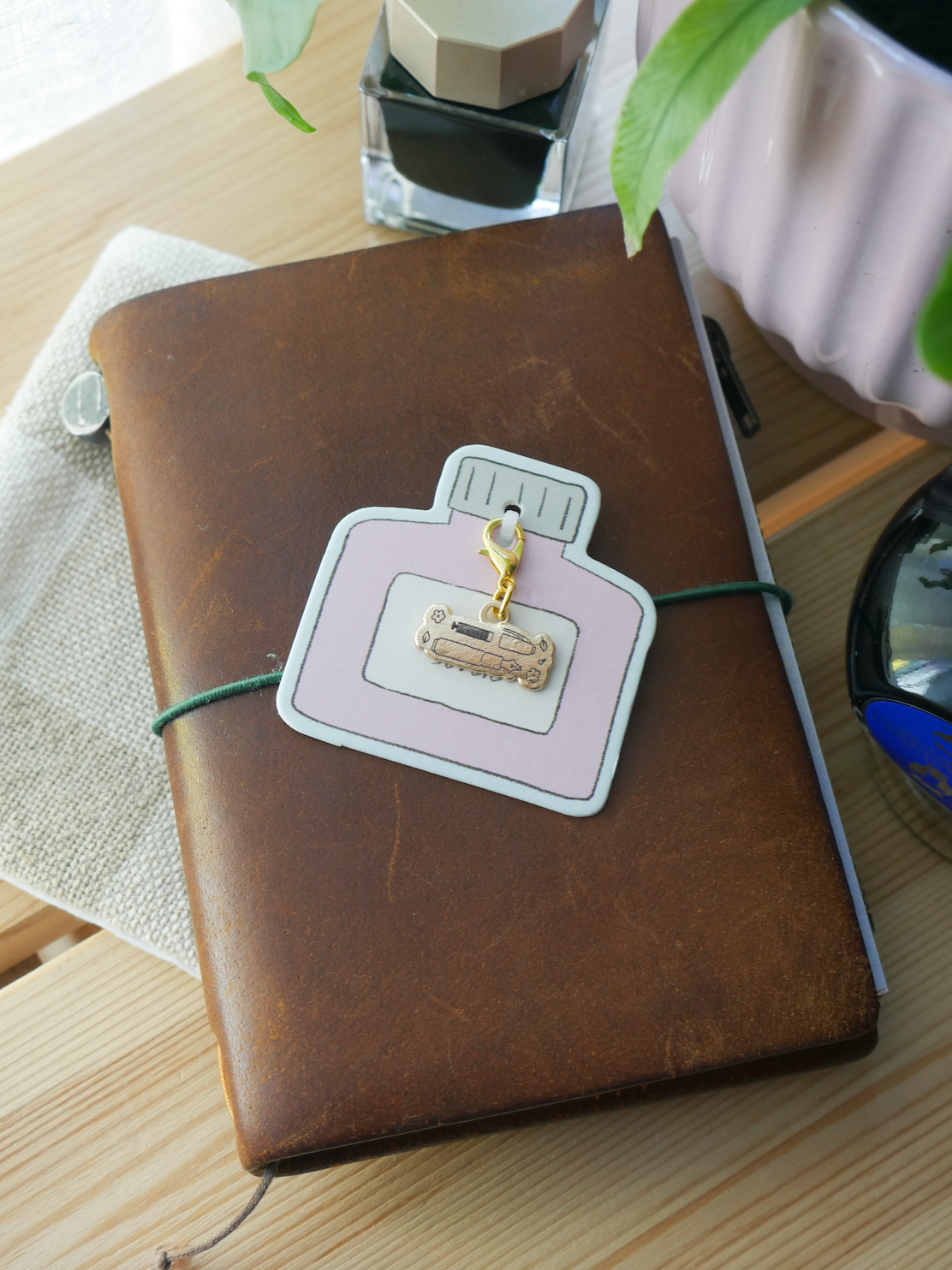 dana ate oatmeal! "handwritten with love" brass charm