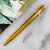 Caran d'Ache 849 Ballpoint Pen - Gold Bar
