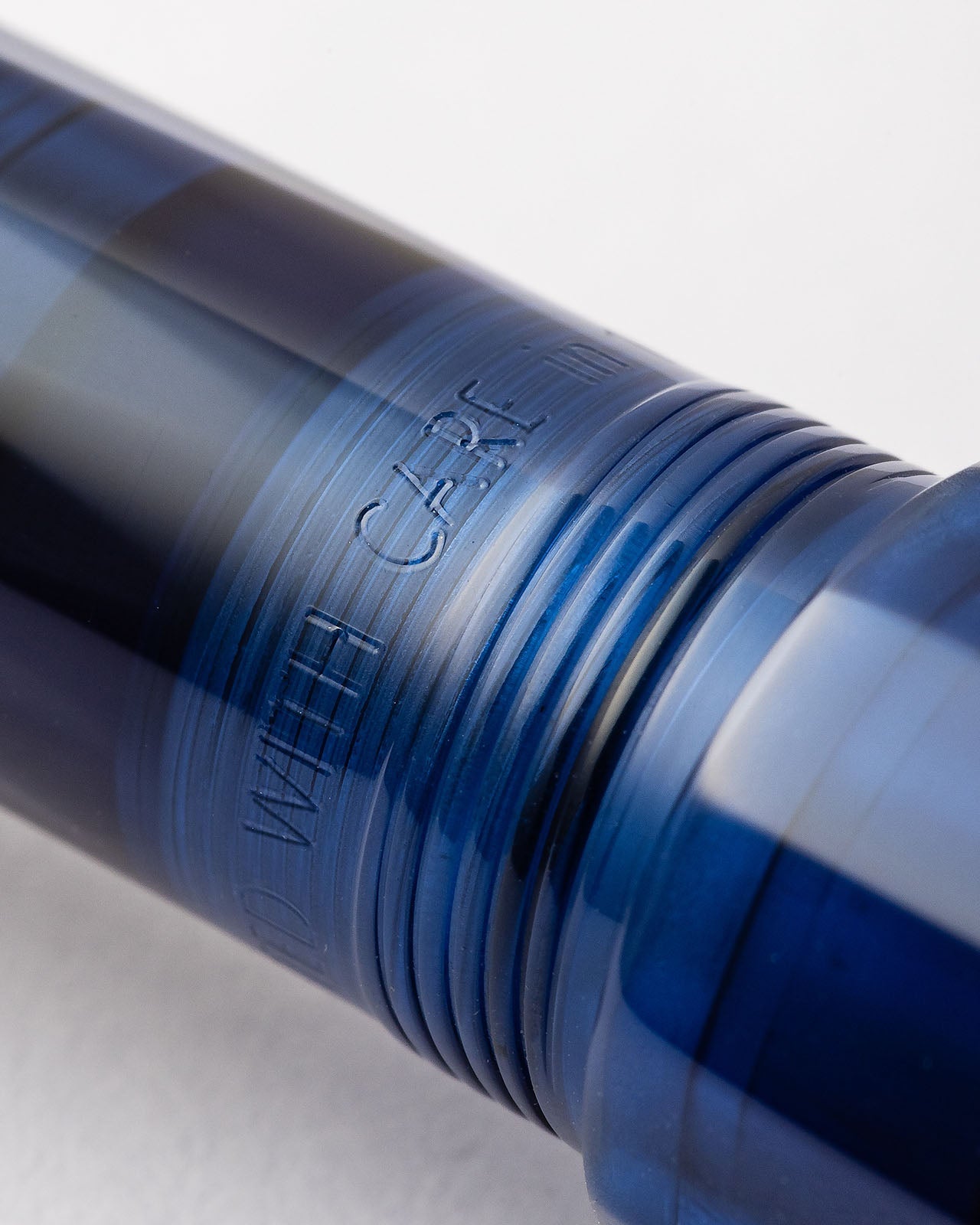 FEEL Blu Sospeso engraved with care detail