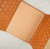 Imperfect Concepts Dancer Leather Notebook - A5 Trifold - Cookiedough Atlas Exclusive w/ Gold Grommets