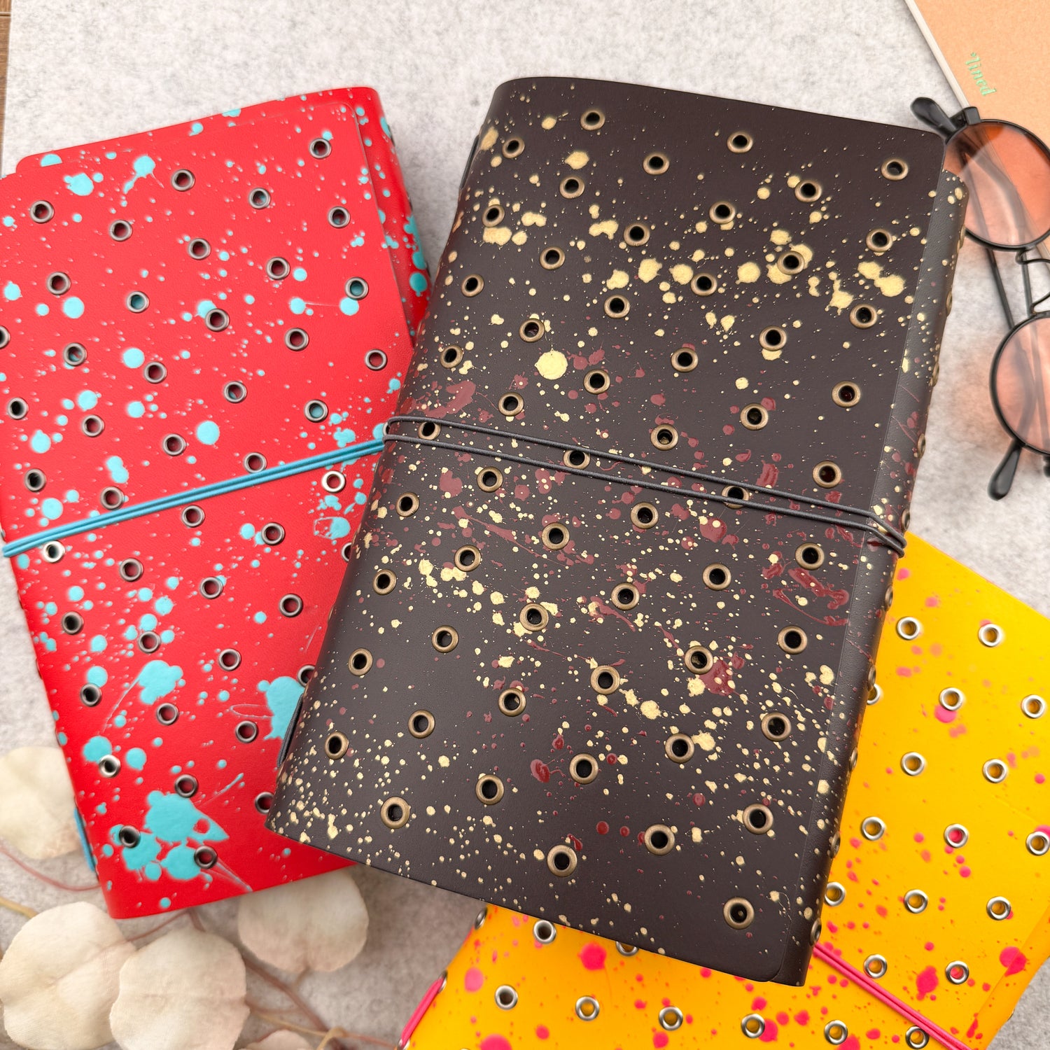 Imperfect Concepts Dancer Leather Notebook - A5 Trifold - Painted Dark Brown w/ Brass Grommets