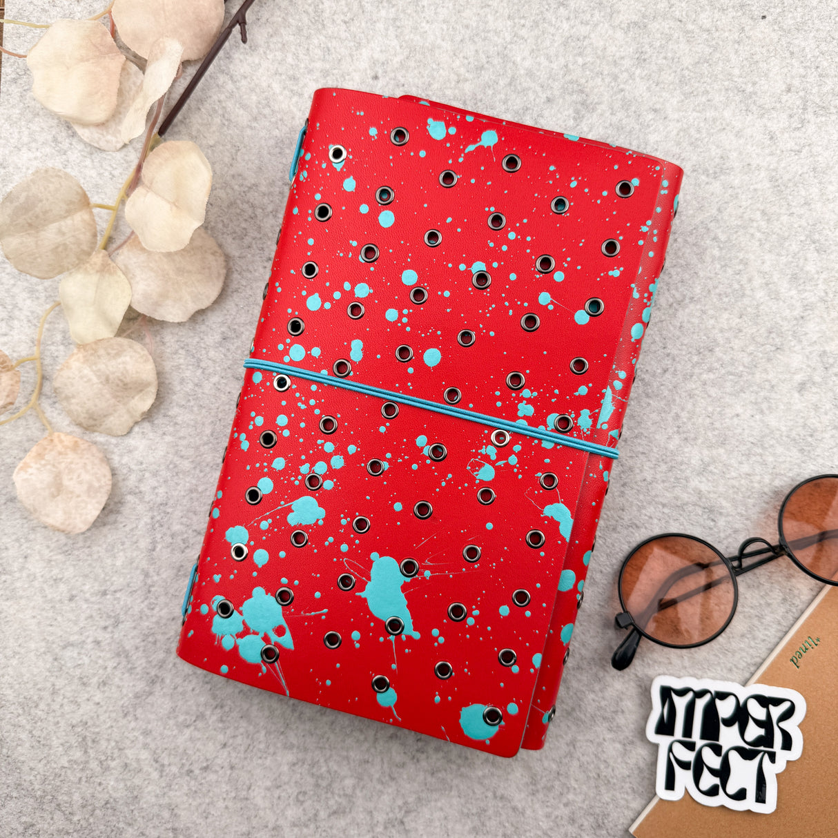 Imperfect Concepts Dancer Leather Notebook - A5 Trifold - Painted Red w/ Gunmetal Grommets