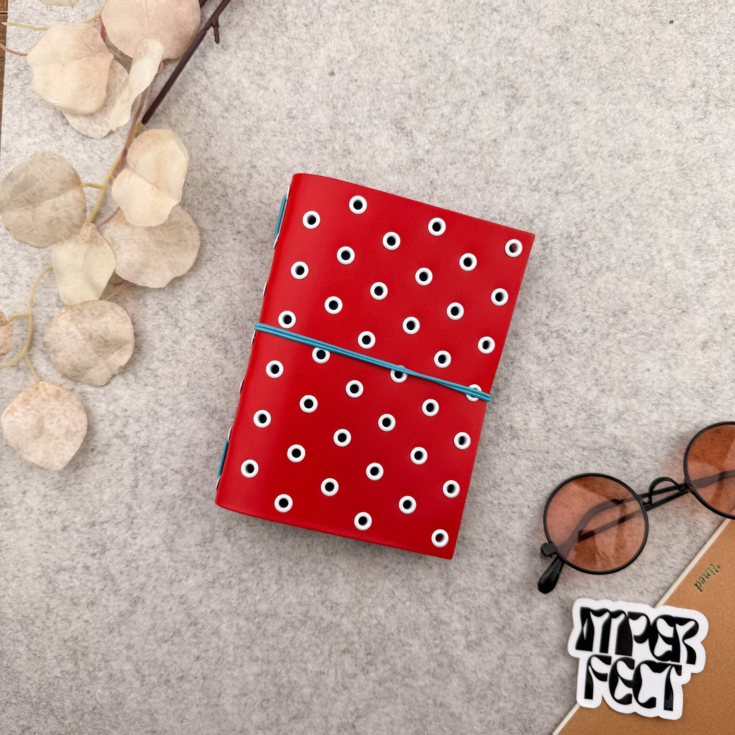 Imperfect Concepts Max Leather Notebook - A6 Bifold - Scarlet w/ White Grommets