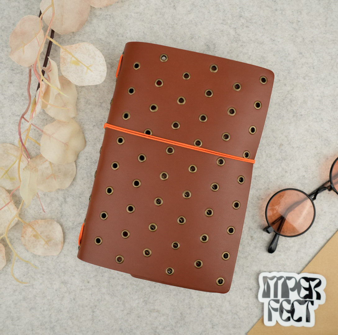 Imperfect Concepts Niko Leather Notebook - B6 Trifold - Chocolate w/ Brass Grommets
