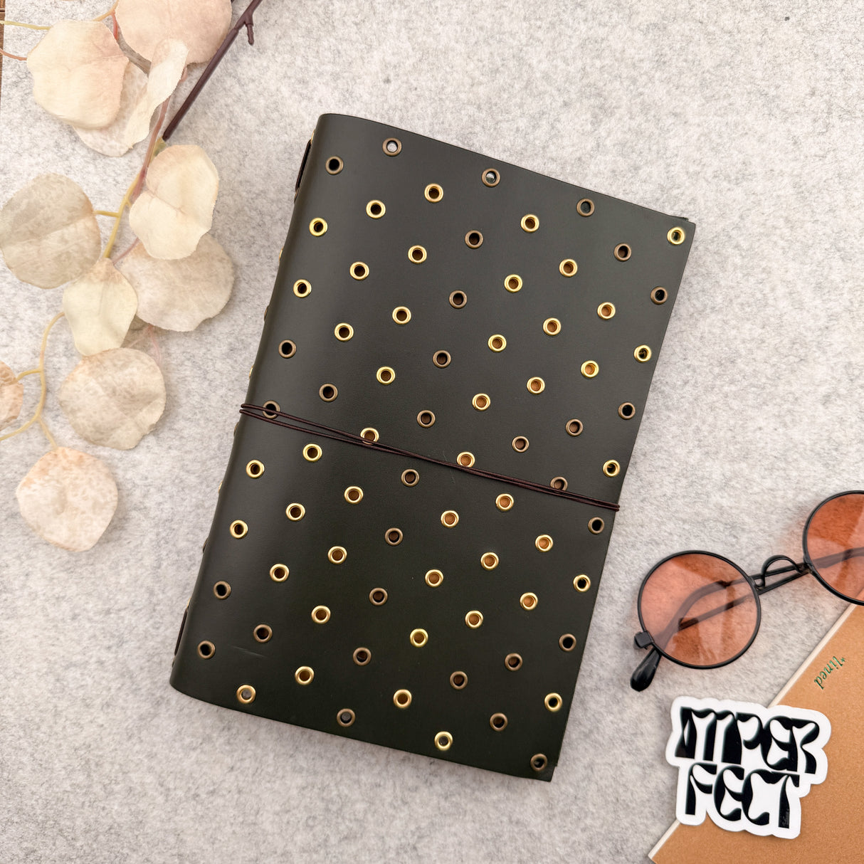 Imperfect Concepts Thatcher Leather Notebook - A5 Bifold - Olive w/ Gold & Brass Grommets