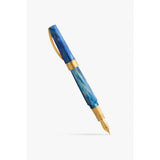Visconti Mirage Mythos Odysseus fountain pen, capped, showing the blue and turquoise swirl acrylic body with gold-tone trim