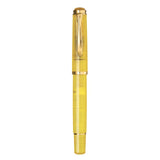 Pelikan Classic 200 Special Edition Pyrite fountain pen, capped, showing the translucent gold shimmer resin body