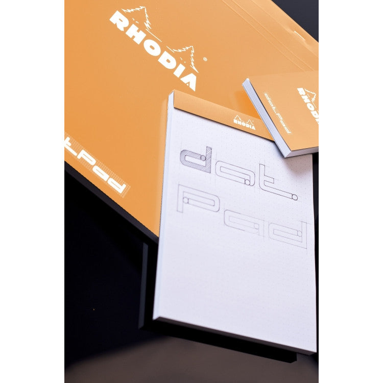 Rhodia Staplebound Notepad - Dot grid 80 sheets - 6 x 8 1/4 - Orange cover | Atlas Stationers.
