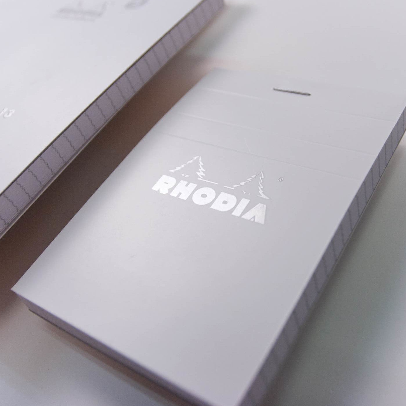 Rhodia Staplebound Notepad - Lined 80 sheets - 4 x 6 - White cover | Atlas Stationers.