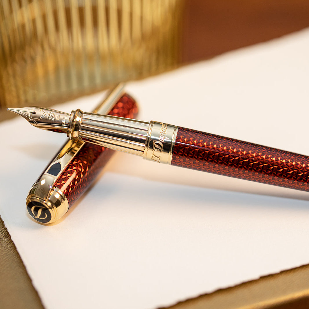 S.T. Dupont Line D Large Fire-head Guilloche Fountain Pen - Amber with Vermeil Trim | Atlas Stationers.